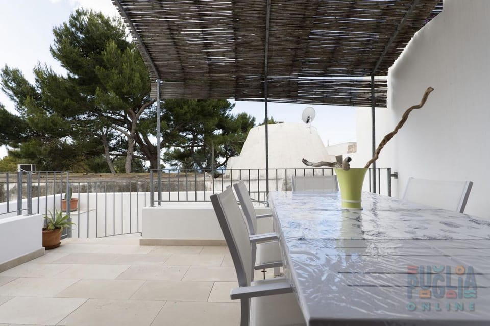Property building, Patio, Day, View (from property/room), Balcony/Terrace, Living room, Seating area, Dining area