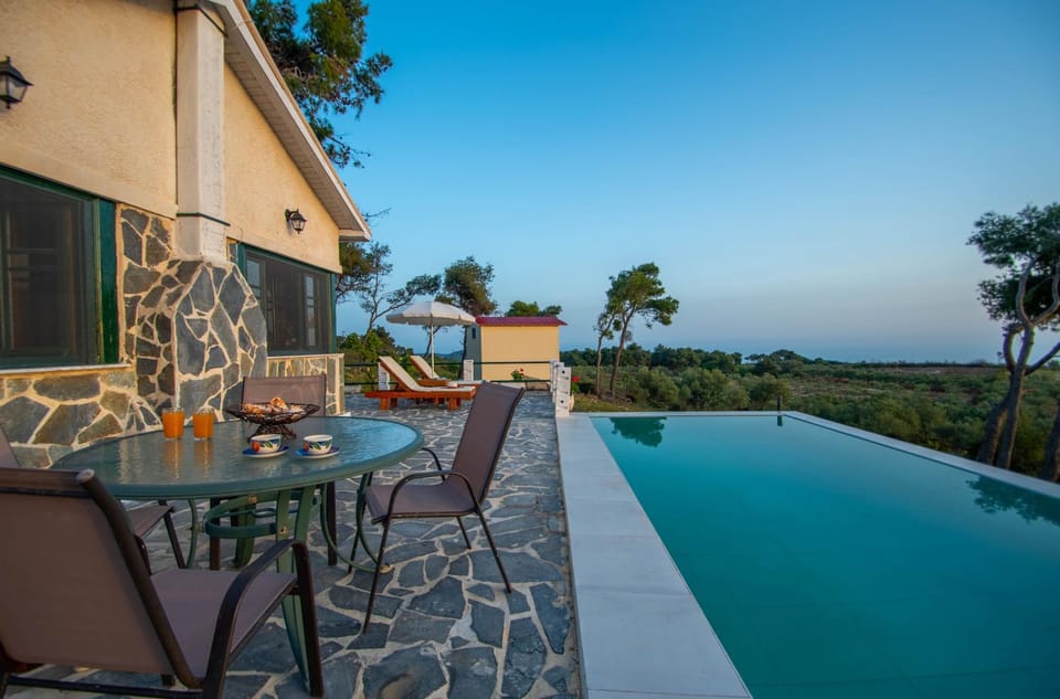 Property building, View (from property/room), Balcony/Terrace, Seating area, Dining area, Pool view, Swimming pool, sunbed