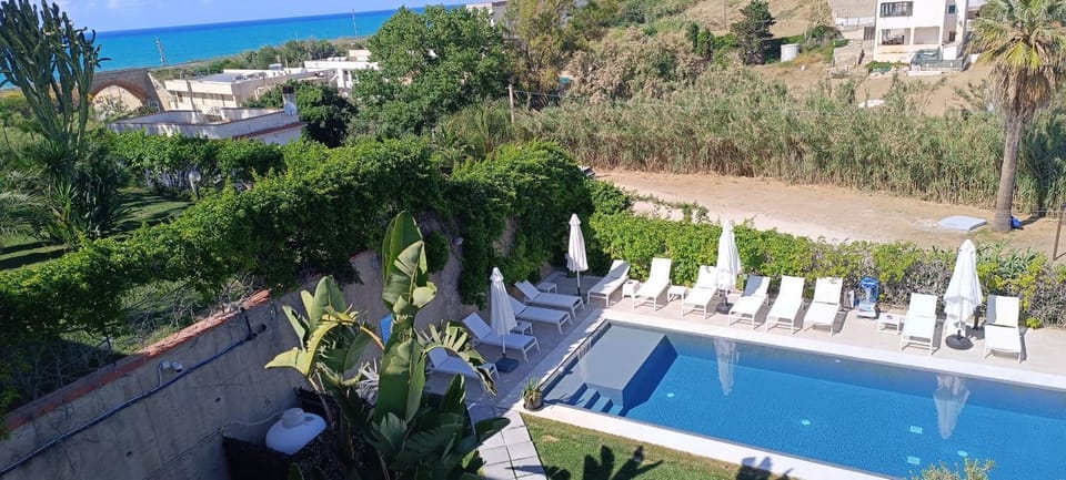 Natural landscape, Garden, Pool view, Sea view, Swimming pool, sunbed