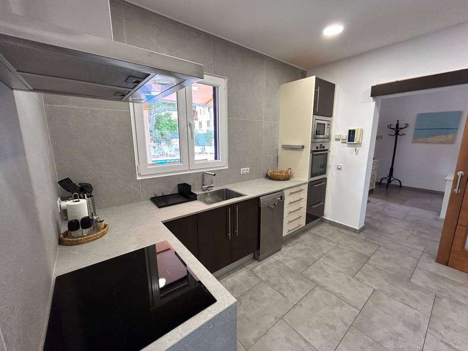 Kitchen or kitchenette, oven, stove, toaster