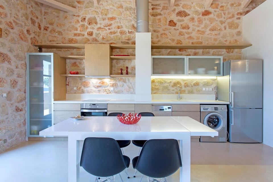 Kitchen or kitchenette, Dining area, dishwasher, stove, washing machine