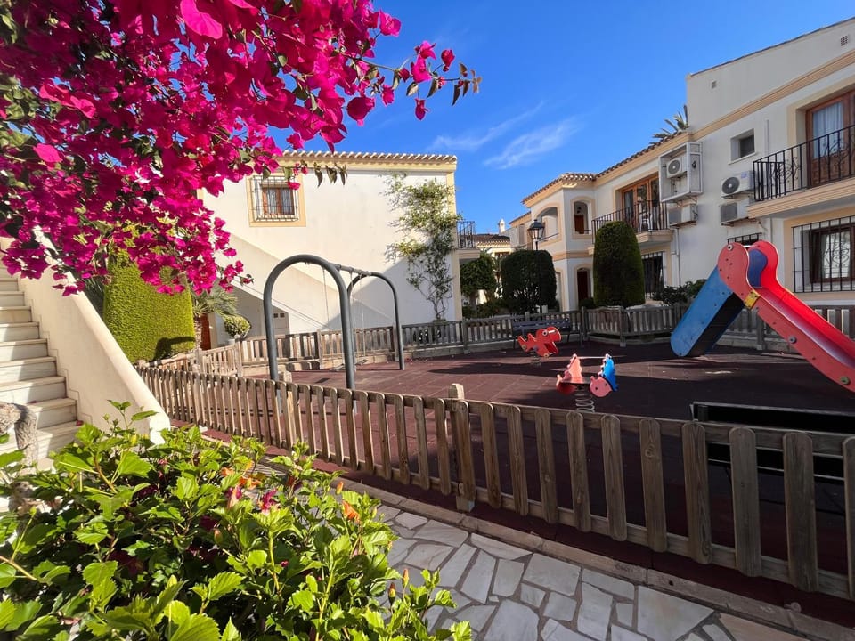Property building, Children play ground, Garden view