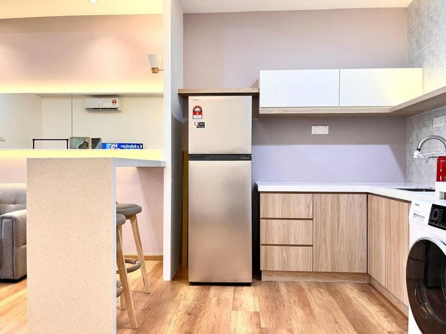 Kitchen or kitchenette, washing machine