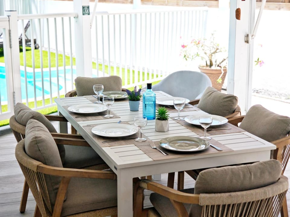 Patio, Dining area, Pool view
