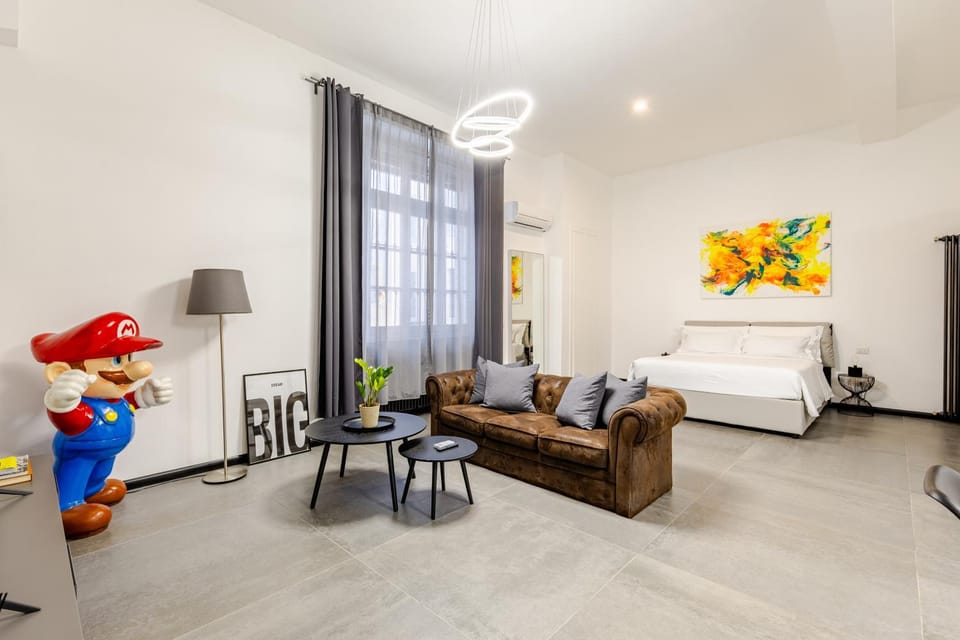 Bed, Living room, Seating area, Bedroom
