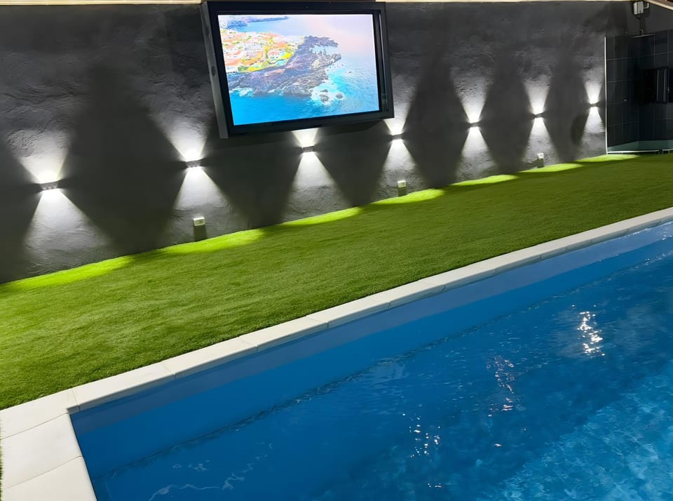 Property building, Living room, Swimming pool