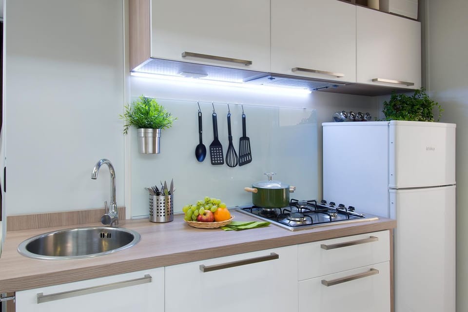 Kitchen or kitchenette, stove, kitchen