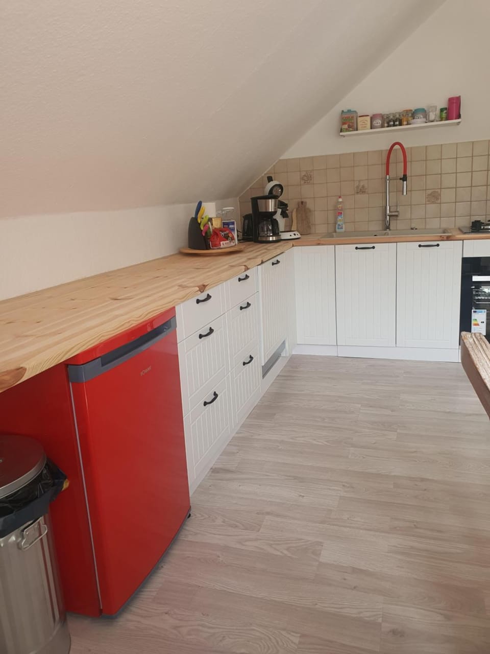 Kitchen or kitchenette, dishwasher, stove, toaster