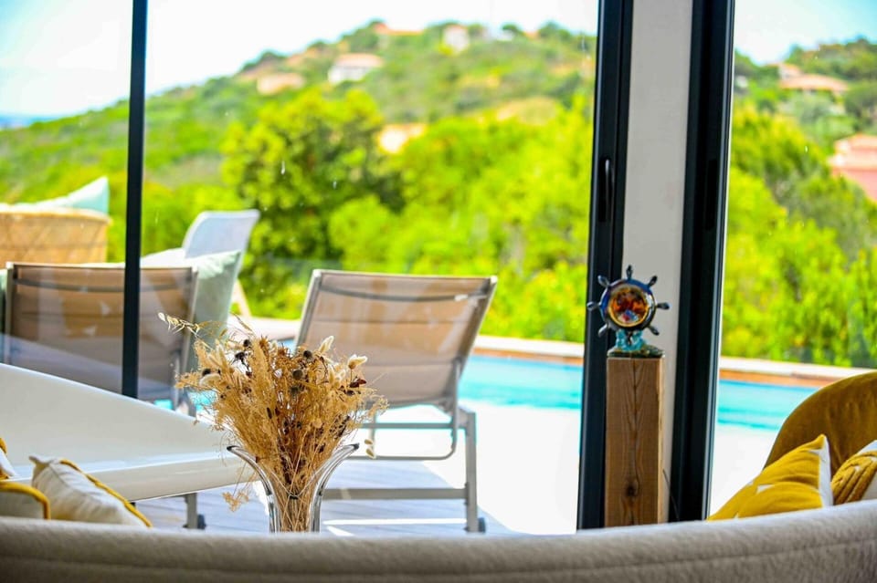Living room, Seating area, Mountain view, Pool view