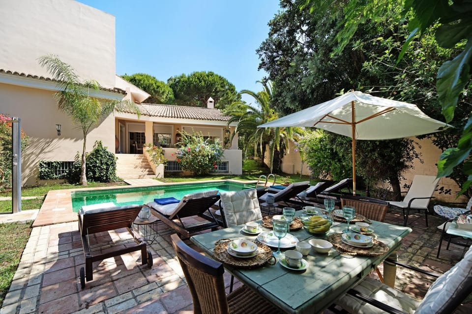 Property building, Living room, Swimming pool