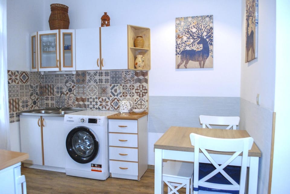 Kitchen or kitchenette, Dining area, washing machine, kitchen