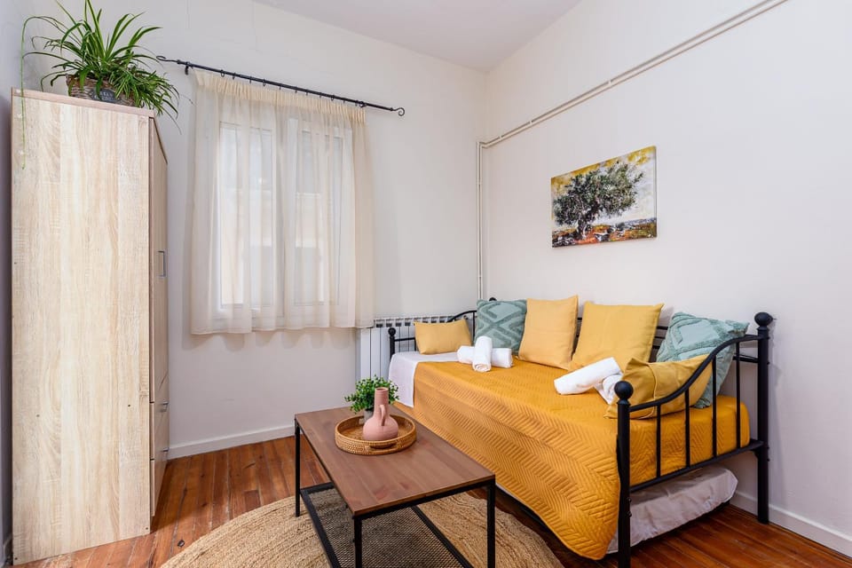 Bed, Living room, Seating area