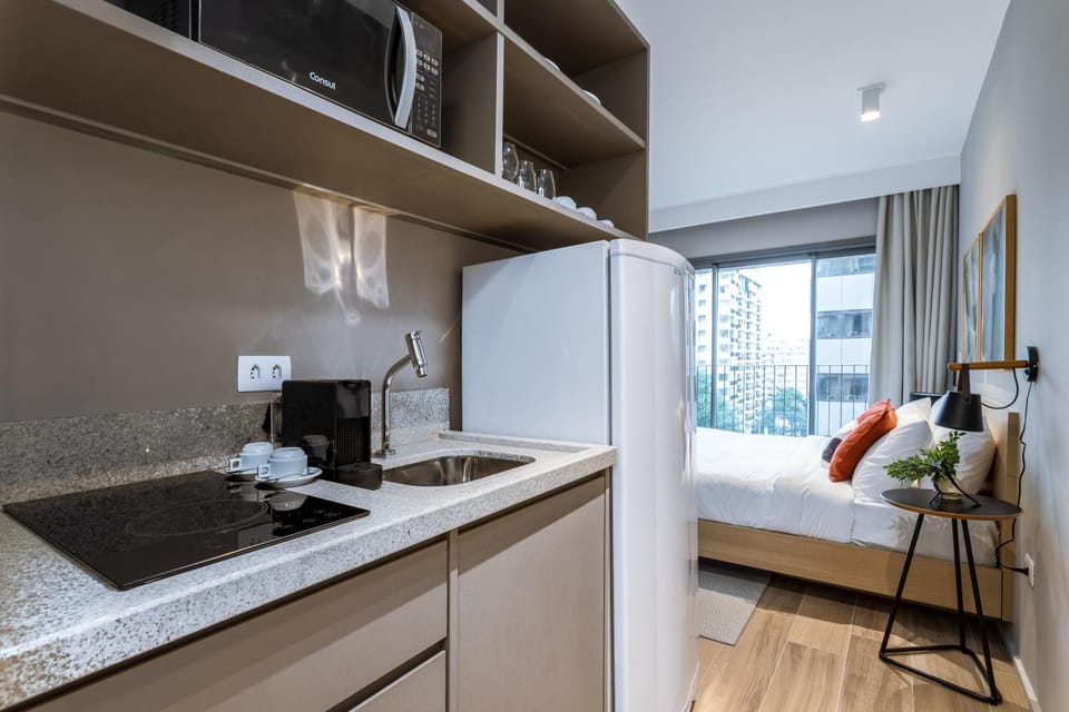 Bed, Day, Coffee/tea facilities, Balcony/Terrace, Kitchen or kitchenette, Photo of the whole room, Bedroom, locker, microwave, stove