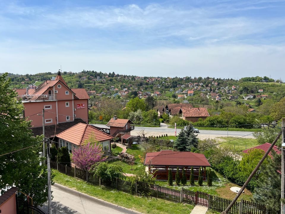 Property building, Neighbourhood, Natural landscape, City view, Street view