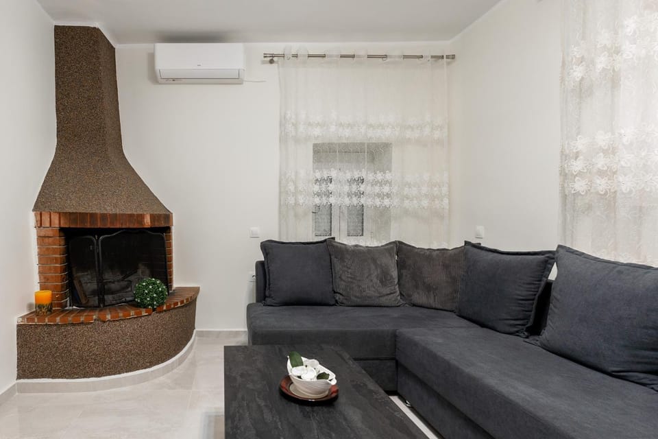 Living room, Seating area, flat iron, air conditioner
