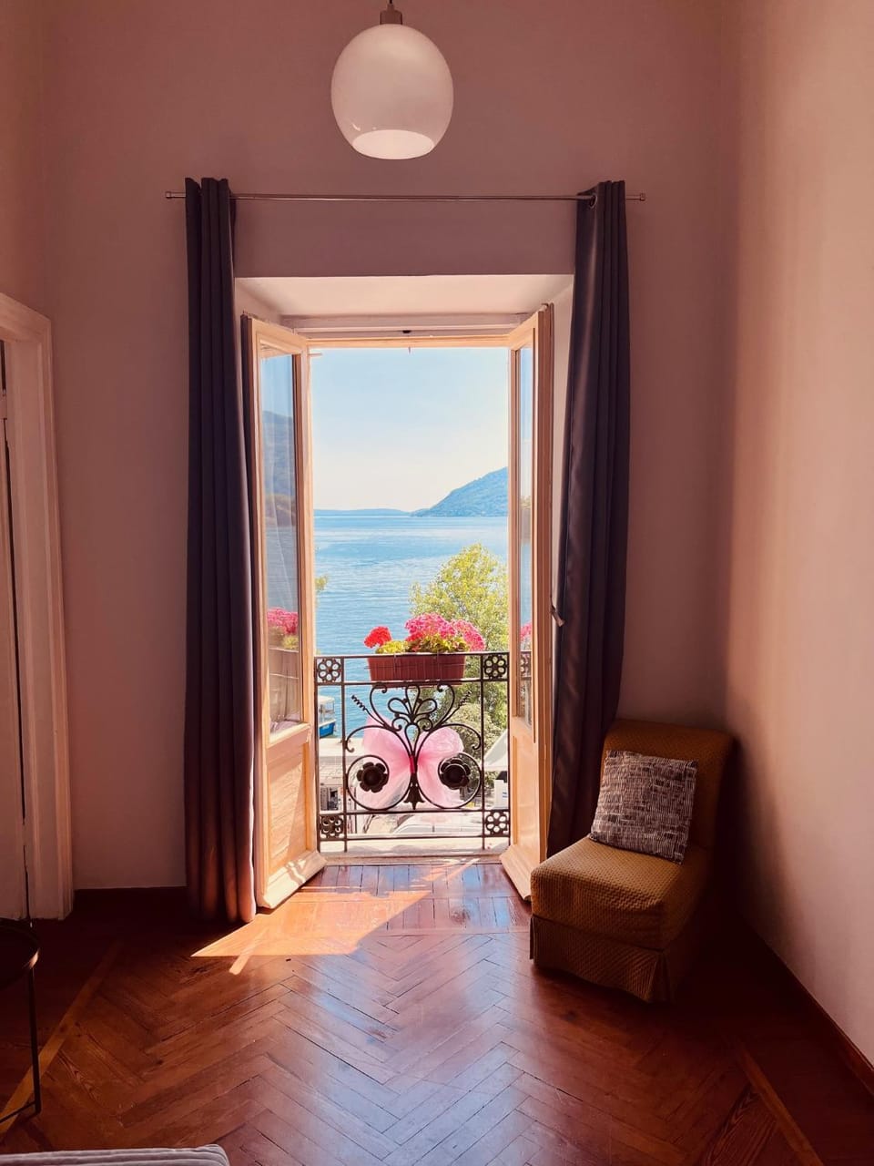 Natural landscape, View (from property/room), Living room, Seating area, Lake view