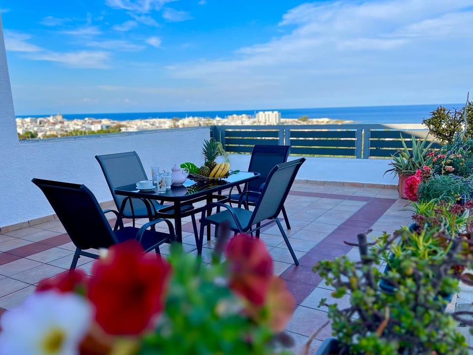 Property building, Patio, Day, Natural landscape, View (from property/room), Balcony/Terrace, Living room, Seating area, Dining area, Sea view, Inner courtyard view