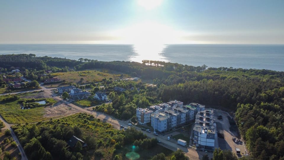 Property building, Day, Neighbourhood, Natural landscape, Bird's eye view, Sea view, Sunset