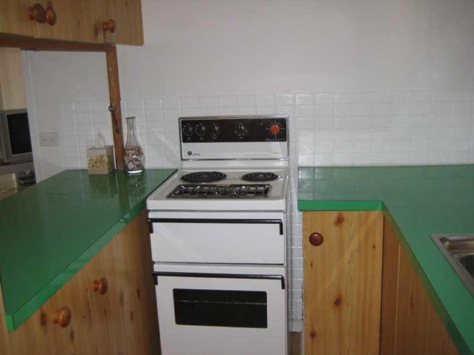 Kitchen or kitchenette, oven, stove