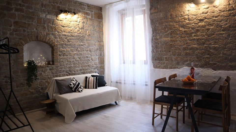 Bed, Living room, Seating area