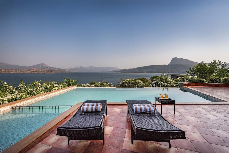 Patio, Nearby landmark, Day, Natural landscape, Mountain view, Pool view, Swimming pool, sunbed, towels
