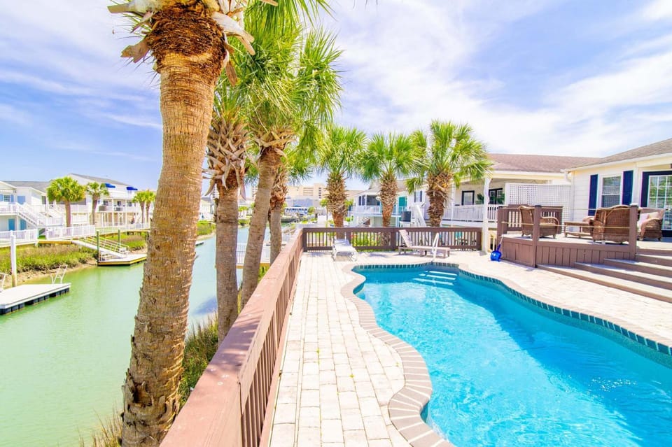 Decked Out Waterfront House w Pool and Tiki Hut House in North Myrtle Beach