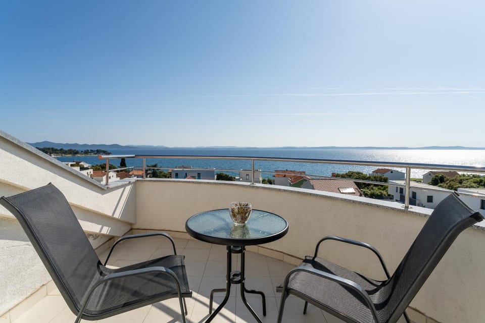 View (from property/room), Balcony/Terrace, Seating area, Sea view