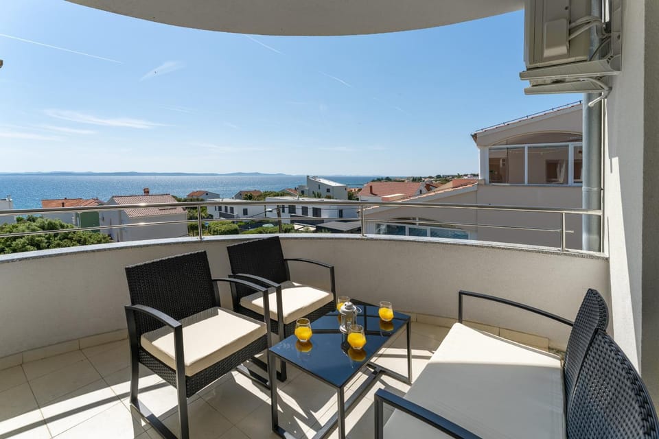 View (from property/room), Balcony/Terrace, Seating area, Sea view