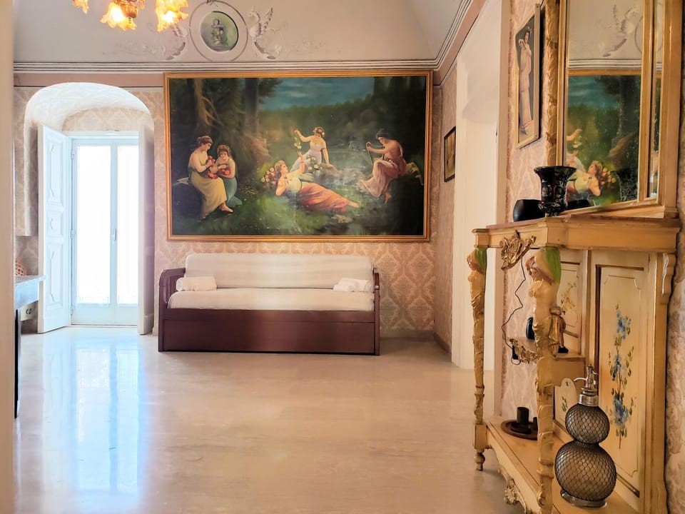 View (from property/room), Living room, Decorative detail, Decorative detail, Seating area, Bedroom
