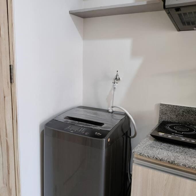NEW Cozy condo unit w/ wifi next to Abreeza Apartment in Davao City