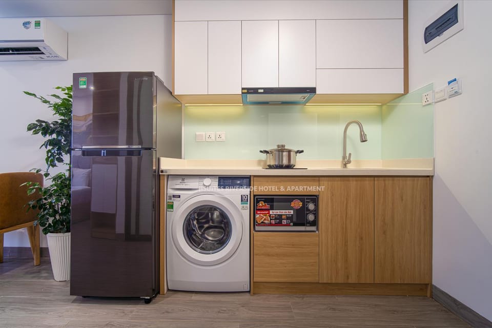Kitchen or kitchenette, minibar, washing machine