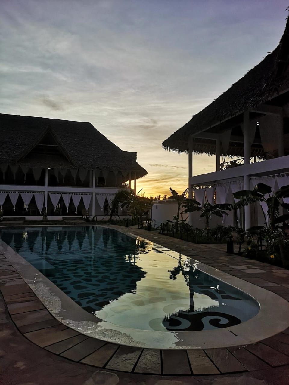 Property building, Facade/entrance, Garden, Swimming pool, Sunset