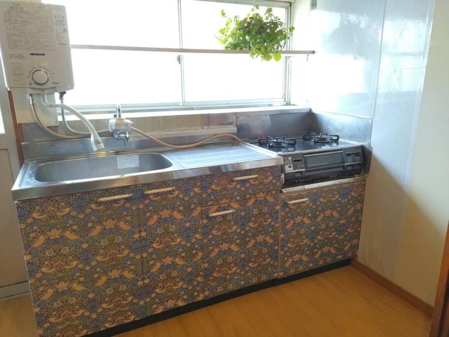 Kitchen or kitchenette, stove
