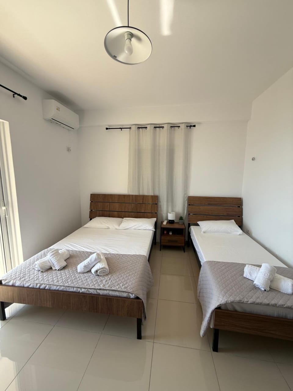 Bed, Photo of the whole room, Bedroom, towels, air conditioner