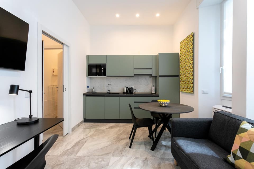 TV and multimedia, Coffee/tea facilities, Kitchen or kitchenette, Living room, Seating area, Dining area, minibar, stove, toaster
