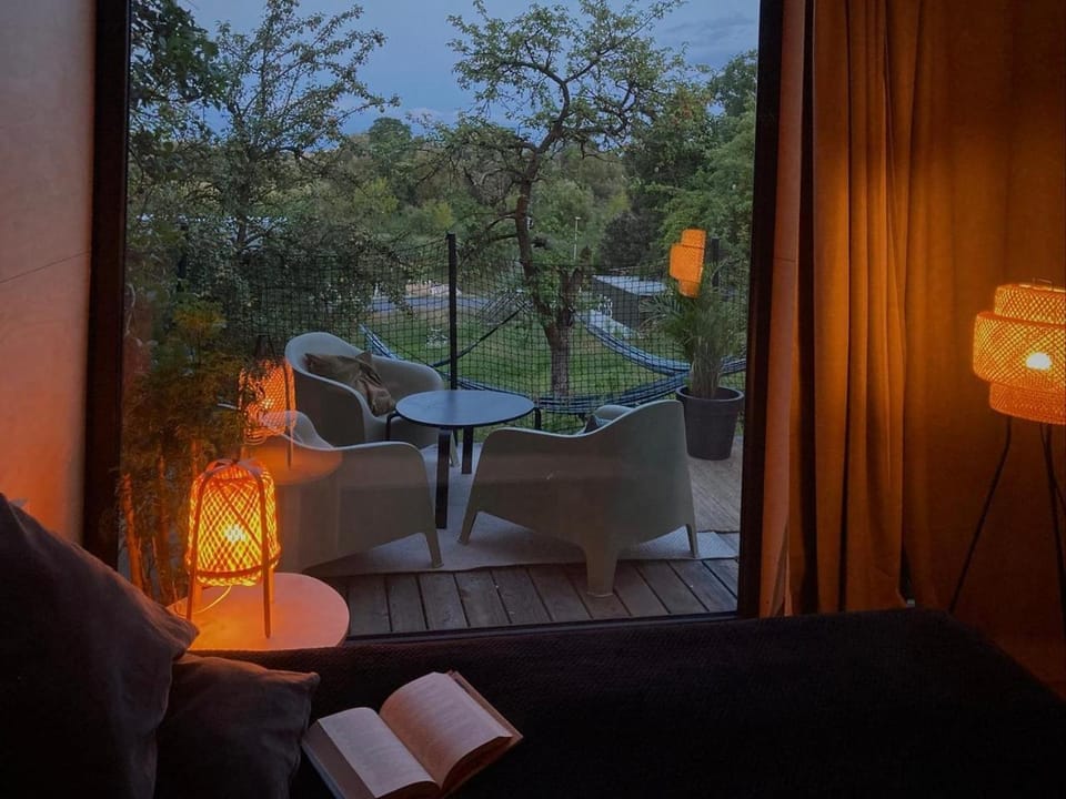 Patio, Night, Garden, Living room, Seating area, Dining area, Garden view