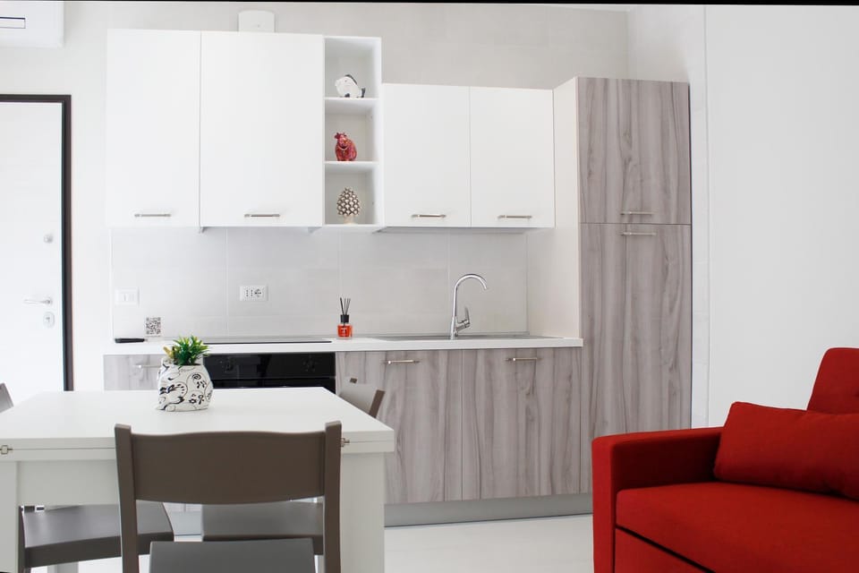 Kitchen or kitchenette, Living room, Seating area, Dining area, stove