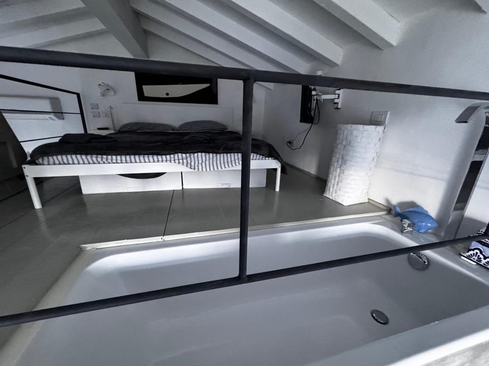 Loft due livelli di design pubblicato su riviste architettura con due posti auto Apartment in Porto Santo Stefano