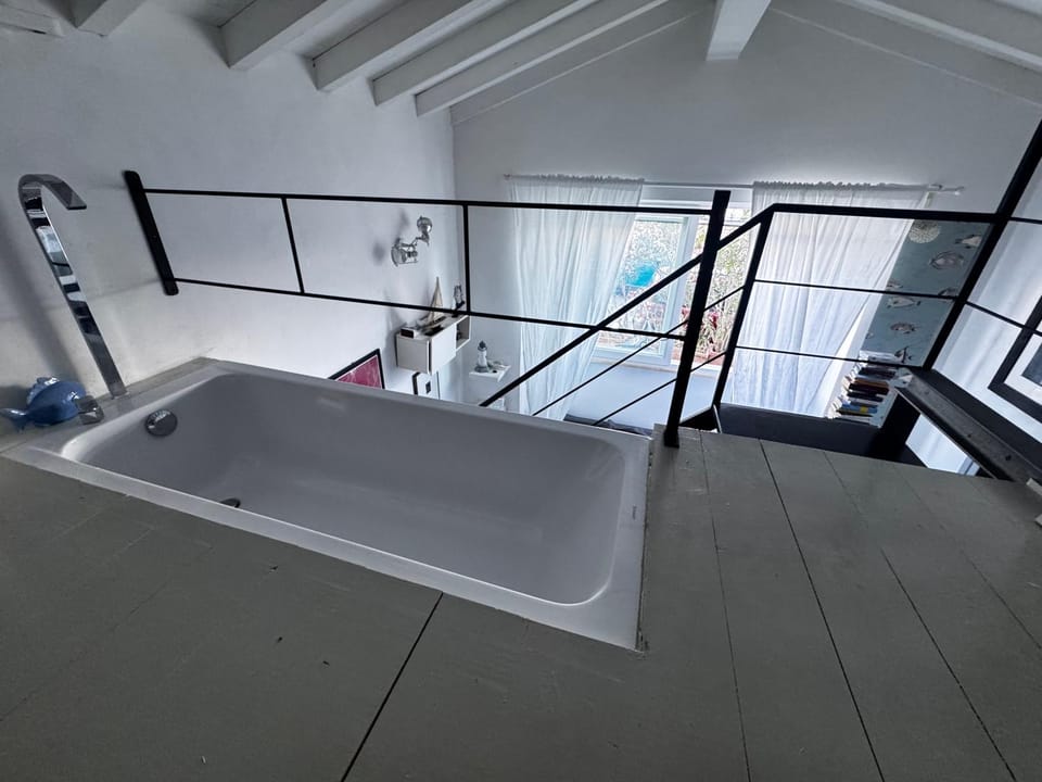 Loft due livelli di design pubblicato su riviste architettura con due posti auto Apartment in Porto Santo Stefano