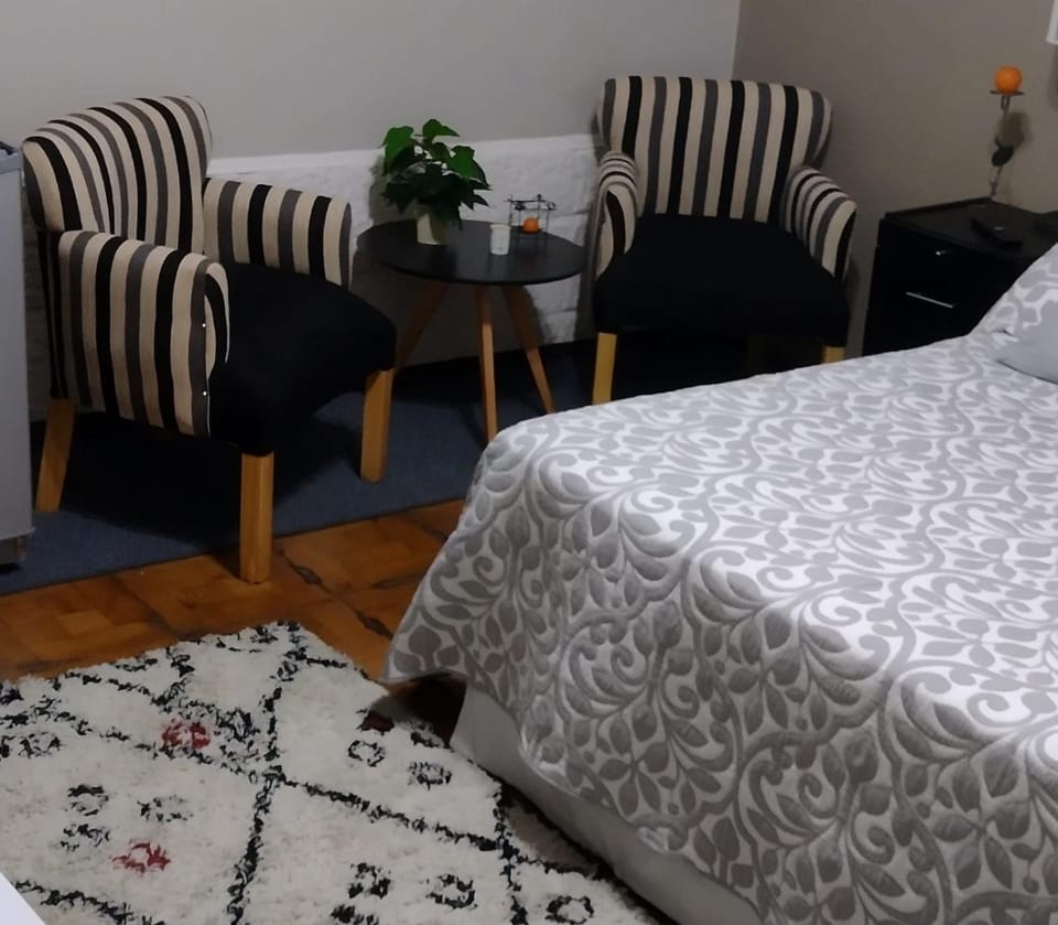 Bed, Seating area, Bedroom