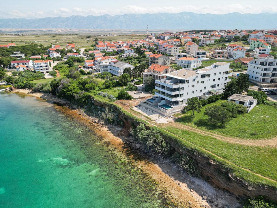 Property building, Nearby landmark, Bird's eye view, Beach, Sea view