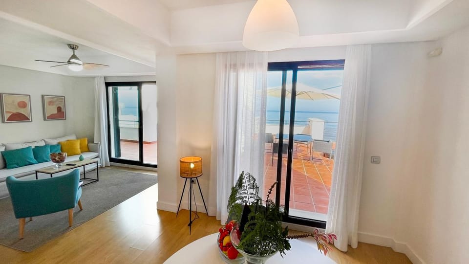View (from property/room), Living room, Dining area, Sea view, fireplace