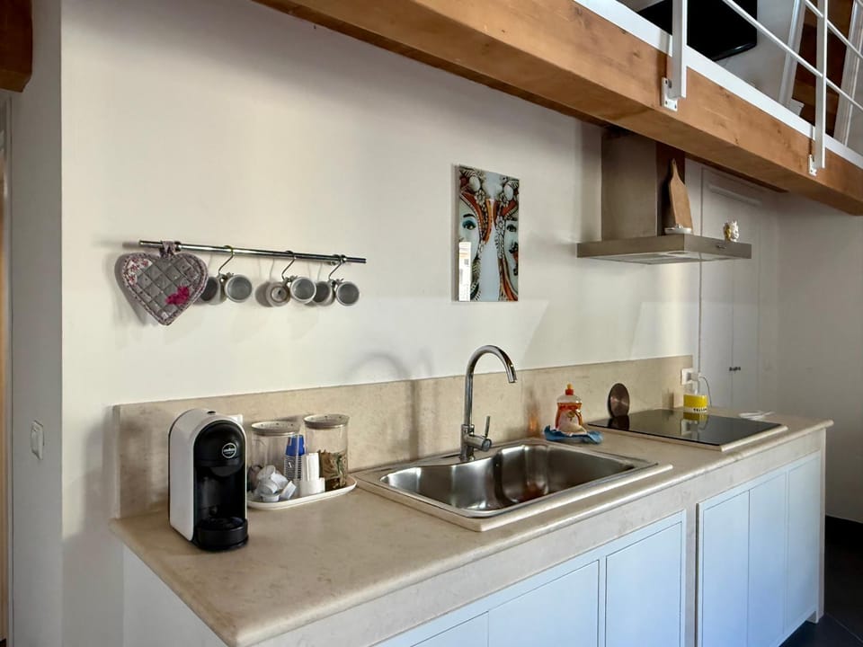 Kitchen or kitchenette, stove, kitchen