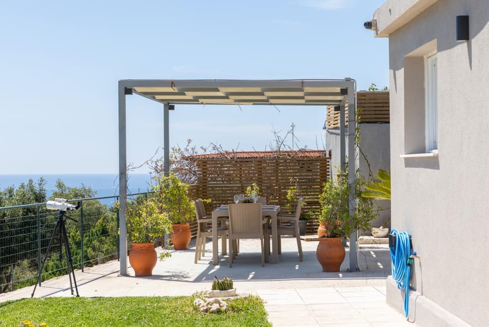 Property building, Patio, Spring, Day, Natural landscape, Garden, View (from property/room), Balcony/Terrace, Dining area, Garden view, Sea view