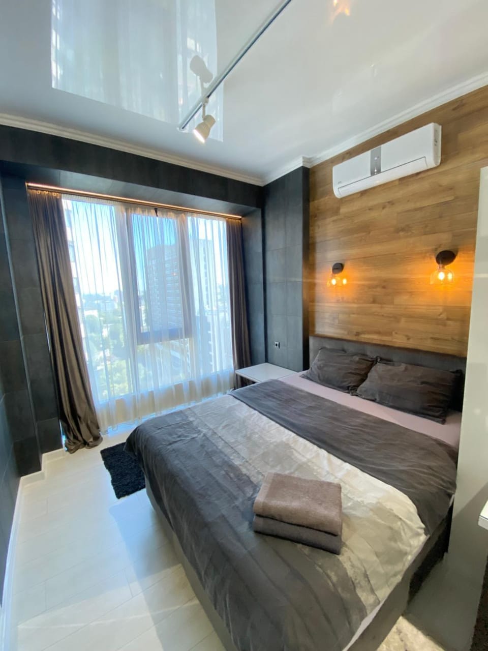 Bed, Photo of the whole room, Bedroom, towels, air conditioner