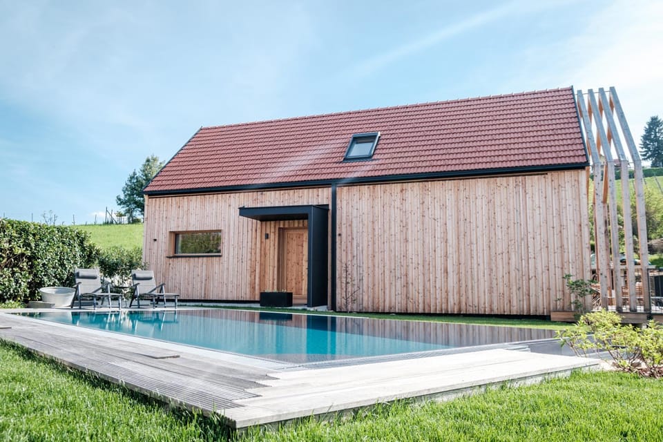 Property building, Day, Pool view, sunbed