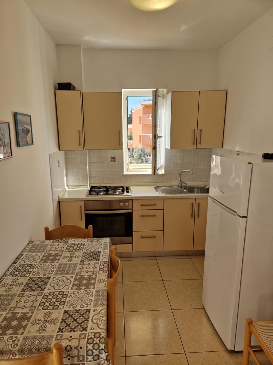 Kitchen or kitchenette, oven, stove