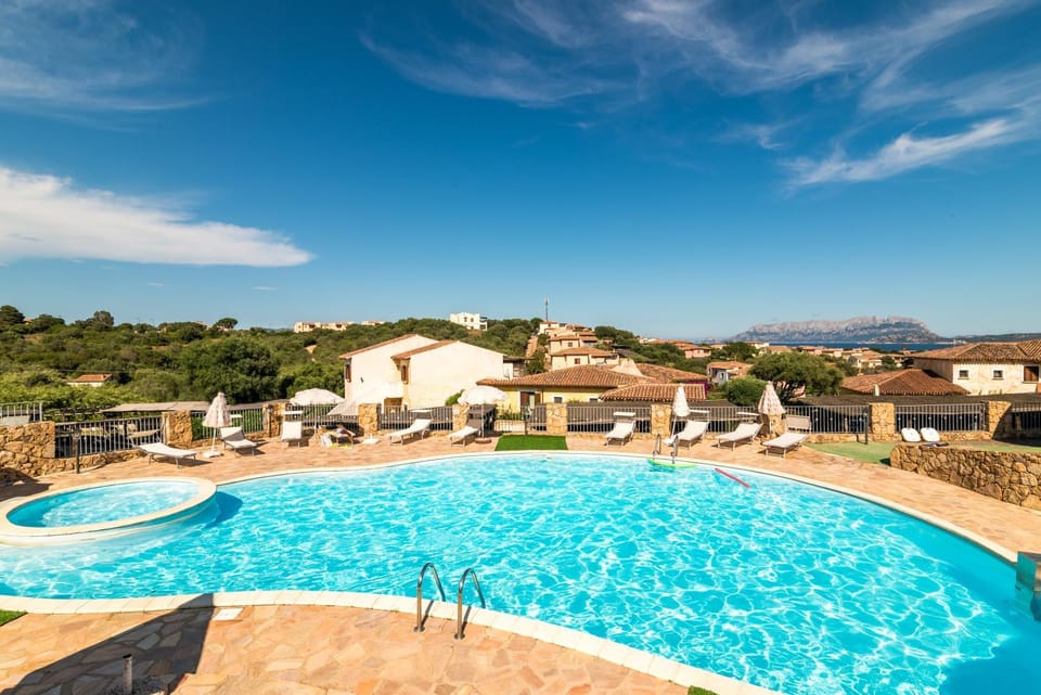 Property building, Living room, Swimming pool