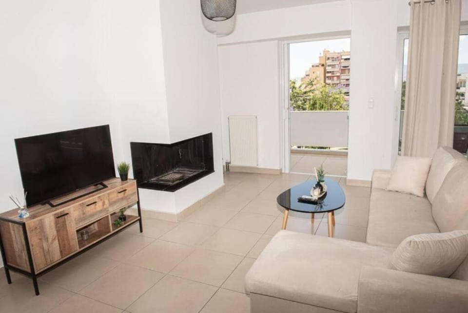 TV and multimedia, Balcony/Terrace, Living room, Seating area, City view, flat iron