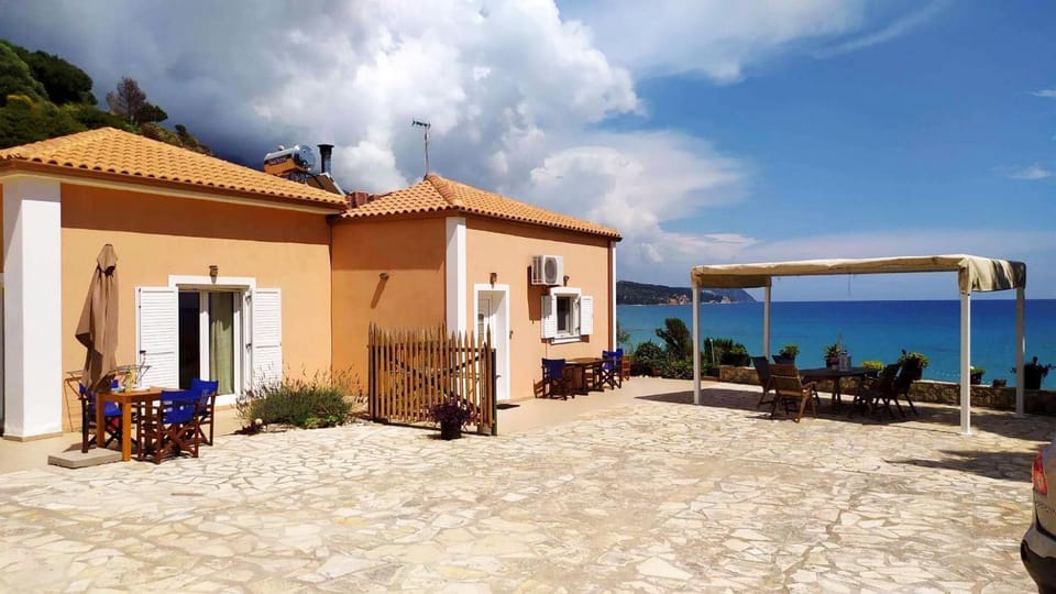 Property building, Patio, Natural landscape, Balcony/Terrace, Sea view